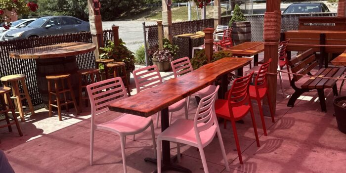 patio Kool Kone outdoor patio covered by a red canopy.